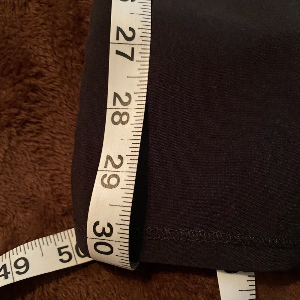 Black scrubs with teal accent. Small ankle split lots of pockets. - Picture 6 of 6